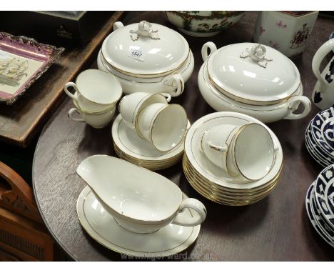 A Royal Worcester 'Contessa' part dinner and tea service including lidded tureens , bowls, gravy boat, teacups, saucers etc.