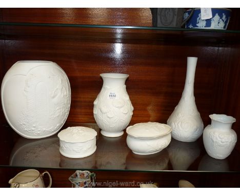 Two Kaiser Germany white bisque porcelain vases, one tulip shape with scene of maid in garden, 9 1/2" tall and the other with