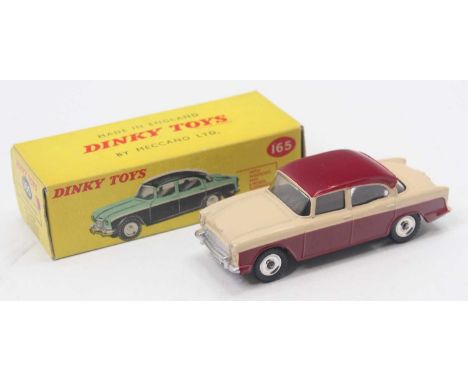 Dinky Toys No. 165 Humber Hawk, maroon lower body and roof, with light beige upper body, spun hubs, sold in the original corr