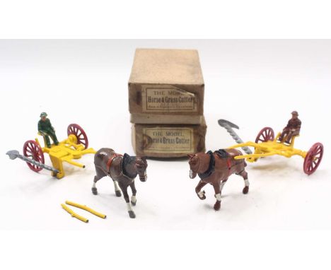 Two Charbens Horse and grass cutter sets, comprising a yellow cutter, with red wheels, a driver and a horse, housed in their 