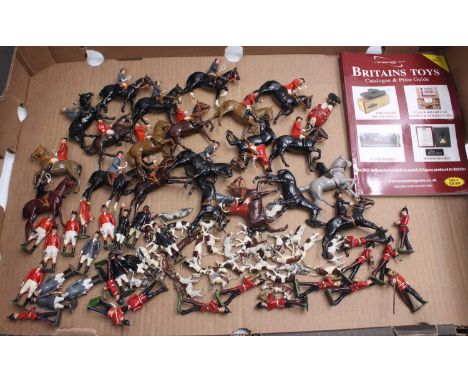 Britains loose lead and hollow painted Hunting related figures to include; Dogs in various poses with huntsmen on horses and 