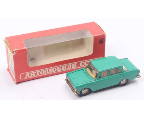 Novoexport 1/43 scale Russian Diecast model of a 412 Moskvich A2 in green body with light tan interior housed in a plastic di