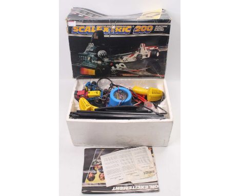 Scalextric 200 electric model racing set, comprising two cars, controllers, a power supply, track and others, all in good con