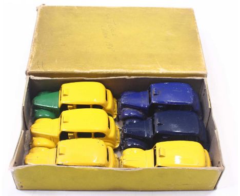 Dinky Toys 40H trade box containing 6 Austin Taxi examples to include; 3 in yellow body with matching hubs, 1 in green lower 