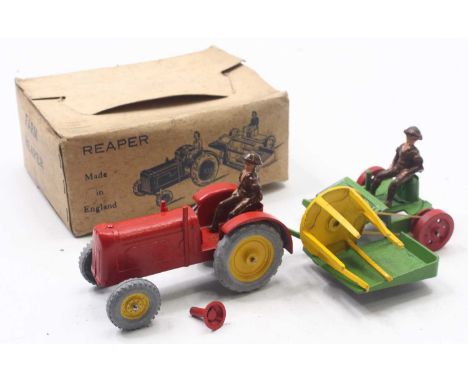 A boxed Charbens Farm series Farm Reaper, comprising orange tractor, with silver hubs and blue tyres, complete with blue and 