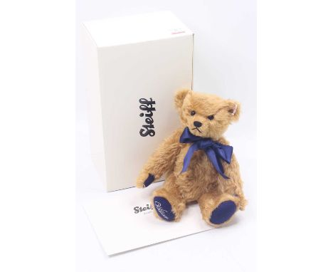 A Steiff limited edition Royal William Bear, red to golden mohair example, with blue ribbon and blue pads with William stitch
