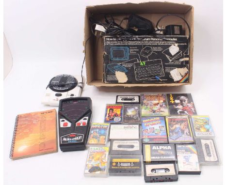 Spectrum ZX Sinclair Personal Computer comprising the charger cable, Basic Programming manual and a quantity of games to incl