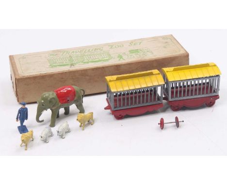 Charbens Series travelling zoo gift set, comprising elephant-drawn cage group fitted with red bases and wheels, with base met