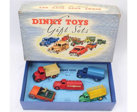 Dinky Toys No.2 Commercial Vehicle Gift Set Comprising; No.25m Bedford End Tipper in red cab with chassis and cream rear, mat