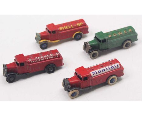 One tray containing four various repainted or touched in Dinky Toy 25 series tankers, to include Mobil Oil comprising red bod