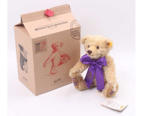 A Steiff Windsor Queen Elizabeth 80th Birthday Celebration bear, blond mohair example with purple 80th ribbon, yellow tag No.
