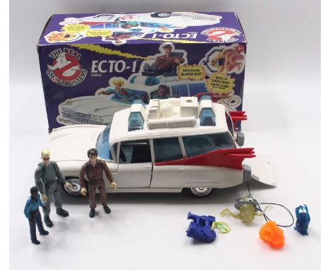 Kenner Ghostbusters Ecto-1 Vehicle together with a small quantity of action figures, housed in a pictorial card box