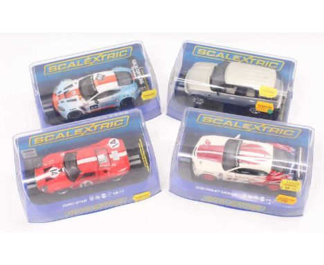 A collection of four various Scalextric modern release slot cars, to include No. C2819 Streetcar Range Rover, a No. C3622 Ast
