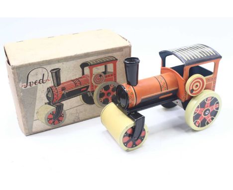 Sved Liberec tinplate clockwork steam roller, manufactured c1950, comprising cream wheels, orange body and a black roof, and 