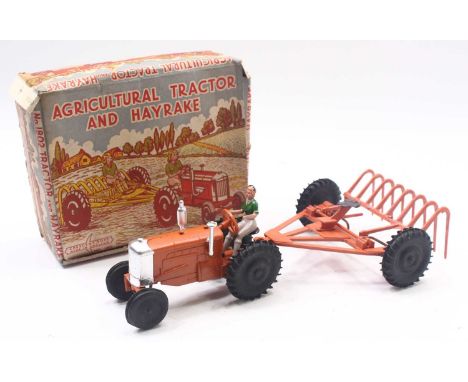 Crescent Toys Agricultural Tractor and Hayrake boxed set, comprising an orange rake with black wheels, a tractor, in orange w