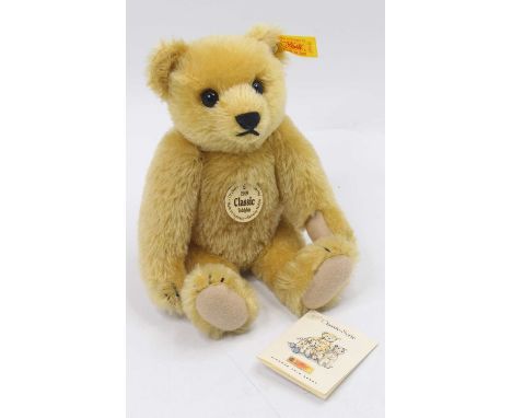 A Steiff No. 000492 golden mohair classic 1909 teddy bear, modern release example with yellow tag No. 000492, height 24cm