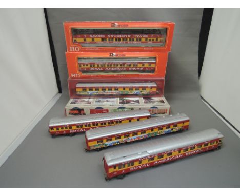 Six Rivarossi HO Scale circus cars (3 boxed) and a Walthers plastic kit enclosed auto carrier