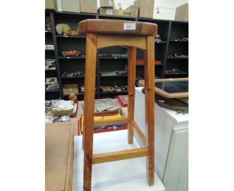 A traditional pine breakfast stool