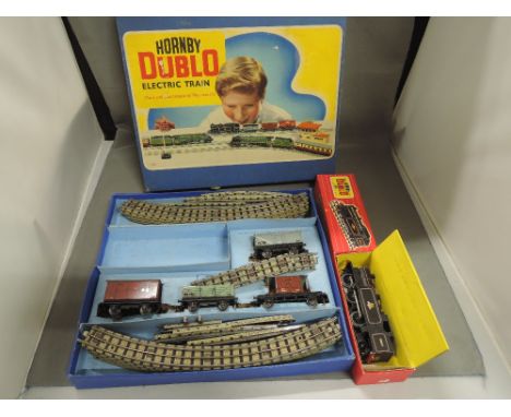A Hornby Dublo OO gauge tank goods train set, comprising 0-6-2 tank engine, four carriages and track, in original box EDG17