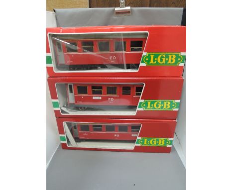 Three LGB G scale items of rolling stock, passenger coaches 3064 x 2, and 3060, all boxed