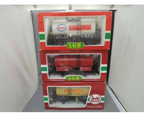 Three LGB G scale items of rolling stock, Esso tanker 4040E, DR tanker 45403 and Minol tanker 45400, all boxed