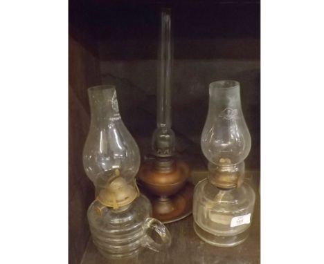 Three assorted vintage oil lamps