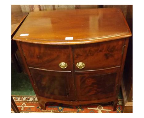 19th century mahogany bow front two door cupboard, probably conversion from a commode  25" wide  