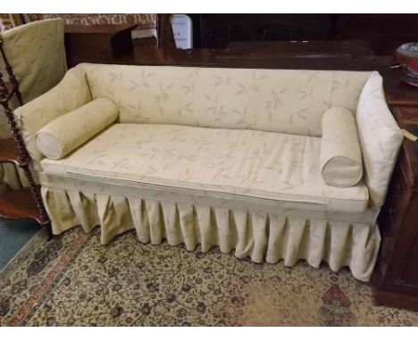 19th century wing back floral upholstered armchair and large Edwardian pale upholstered sofa with loose cushions, 74" wide 