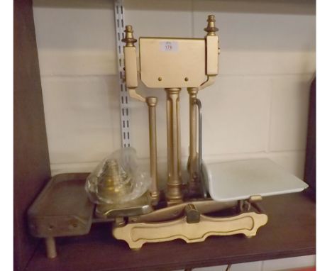 Vintage gilt painted shop scales with graduated set of brass weights 