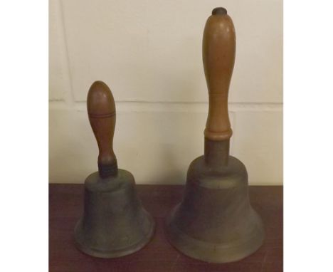 Two vintage brass and wooden-handled hand bells