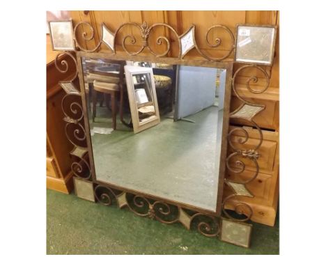 20th century wall mirror, in decorative scrolled iron frame, 39" wide 