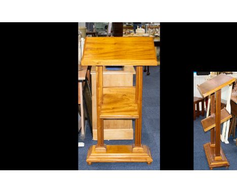 Mid 20th Century Mahogany Lectern.  Two tiers on raised square fluted supports, rectangular base on bobbin feet.  Measures 47