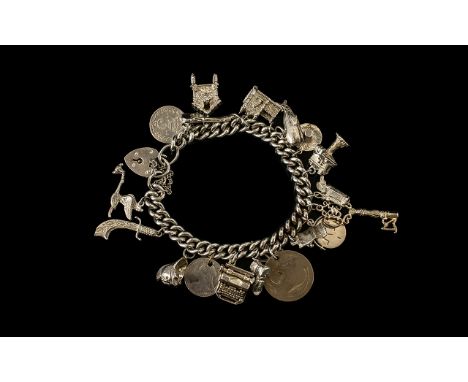 1960's - Sterling Silver Albert Bracelet Loaded with 20 Good Quality Silver Charms. All Marked for Sterling Silver and In Exc