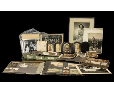 A Large Collection of Vintage Photographs from the 1920's to include a framed portrait by 'Photography by Herbert', Weymouth,
