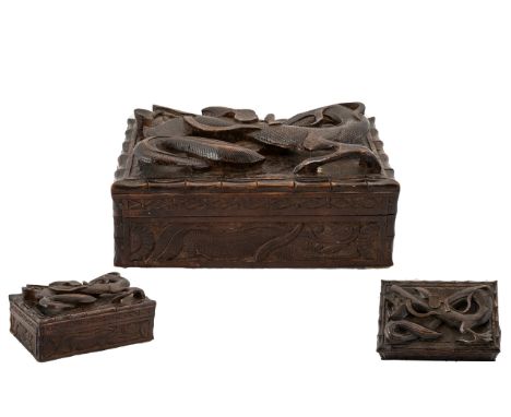 Japanese Early 20th Century Finely Carved Wooden Lidded Trinket Box, The Top Cover with Applied Carvings of a Dragon In a Flo