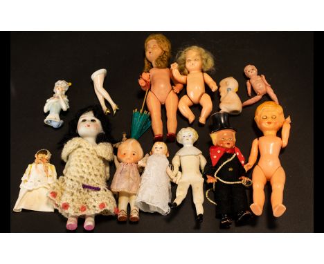 Collection of Small and Miniature Bisque, Plastic and Celluloid Dolls, including a Japanese Futamara girl, a Mabel Lucie Attw