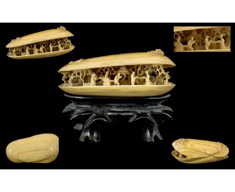 Japanese - 19th Century Wonderful Carved Ivory Clam Shell with Figures Raised on a Carved Wooden Display Stand of Good Qualit