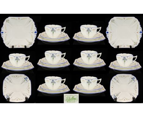 Shelley Fine Quality 1930s Fine Bone China 35 Piece Tea Service 'Blue Iris'.  Pattern No. 11561.  Iris with green leaves on s