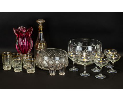 A Collection of Glassware to include six original babycham glasses, a ruby red flared rim flower vase measuring 9 inches in h