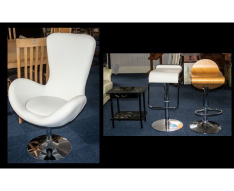 A Modern Contemporary Swivel Chair in Cream Leatherette on a chrome circular frame. Together with two modern bar stools, one 