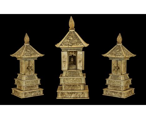 Japanese 19th Century Carved Ivory Stepped Shrine / Temple with Seated Deity Figures Within, Age Related Patina. Height 9 Inc