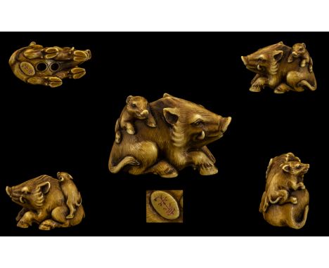 Japanese Tokyo School Signed Superior Quality Meiji Period- 1864 - 1912  Carved Signed Ivory/Bone Netsuke depicting a hog wit