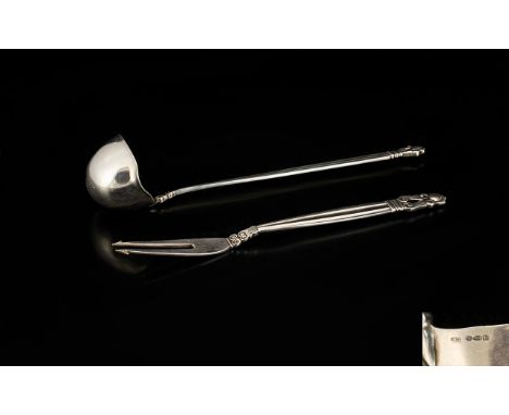 Georg Jensen, a Danish Silver Acorn Pattern Sauce Ladle  And Pickle/Olive Fork.  post 1945 stamped marks, designed by Johan R