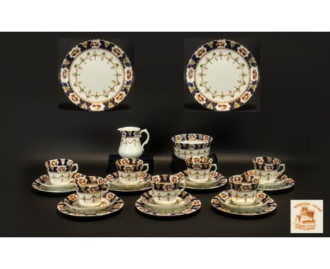 Part Tea Service 'Windsor' by J H Walton comprising 9 teacups, 12 saucers, 11 sandwich/cake plates, one large sandwich/cake p