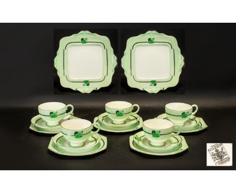 Art Deco Paragon Part Tea Service.  Replica of service made for H M the Queen.  Comprises:  five cups, five saucers and 6 sma