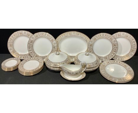 A Wedgwood Gold Florentine pattern dinner service, comprising pair of vegetable dishes and covers, sauce boat on stand, oval 