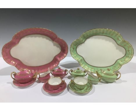 A Royal Doulton miniature tea service, comprising teapot, sucrier and cover, cream jug, teacup and saucer, on quatrefoil tray