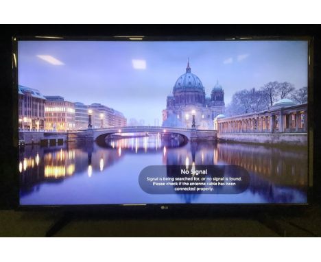 An LG 43" television, model no. 43UH610V-ZB, with remote 