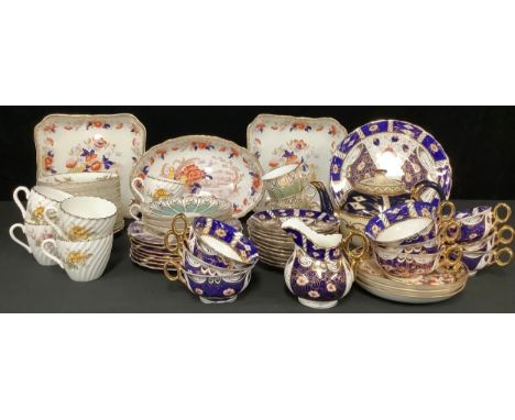 A Victorian Kensington Fine Art Imari part tea service, comprising cake plate, side plates, cream jug, cups and saucers; anot