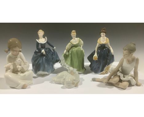 A Royal Doulton figure, Melanie, HN2271; others, Fragrance, HN2334: Fair Lady, HN2193; a Nao, by Lladro, figure, Ballerina; o
